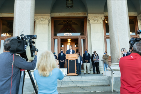 Rep. Ritter addressing the media